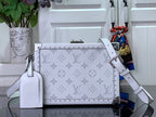 Men's Louis Vuitton bag with light monogram print, studded trim, top handle straps