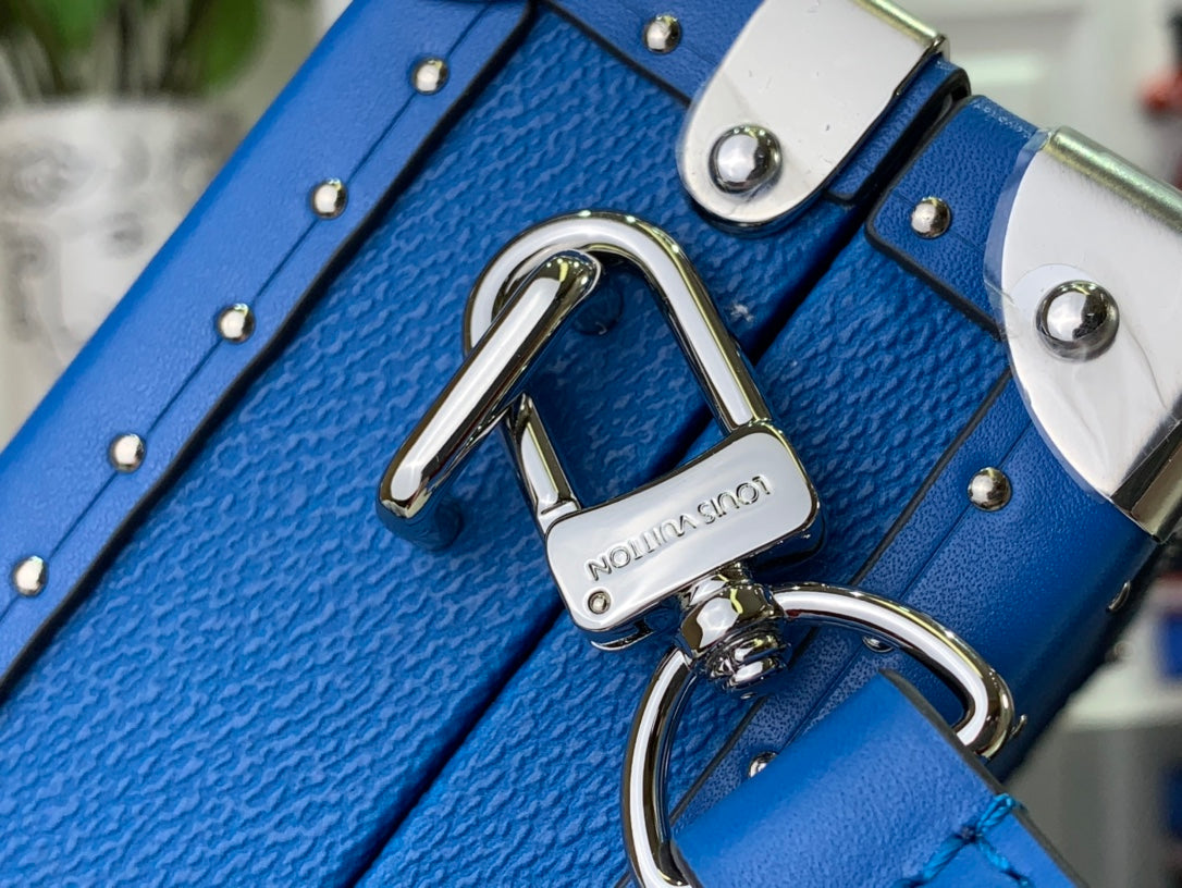 Louis Vuitton blue bag strap with silver hook and D-ring hardware