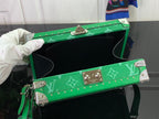 Louis Vuitton men’s green monogram bag open top showing dark interior lining