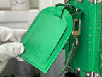 Green Louis Vuitton bag strap with leather tab and silver ring hardware
