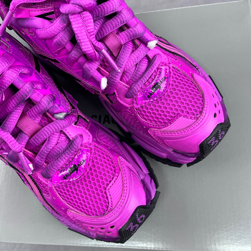 Balenciaga running sneakers heel close-up, bright pink mesh and molded accents
