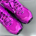 Balenciaga running sneakers heel close-up, bright pink mesh and molded accents