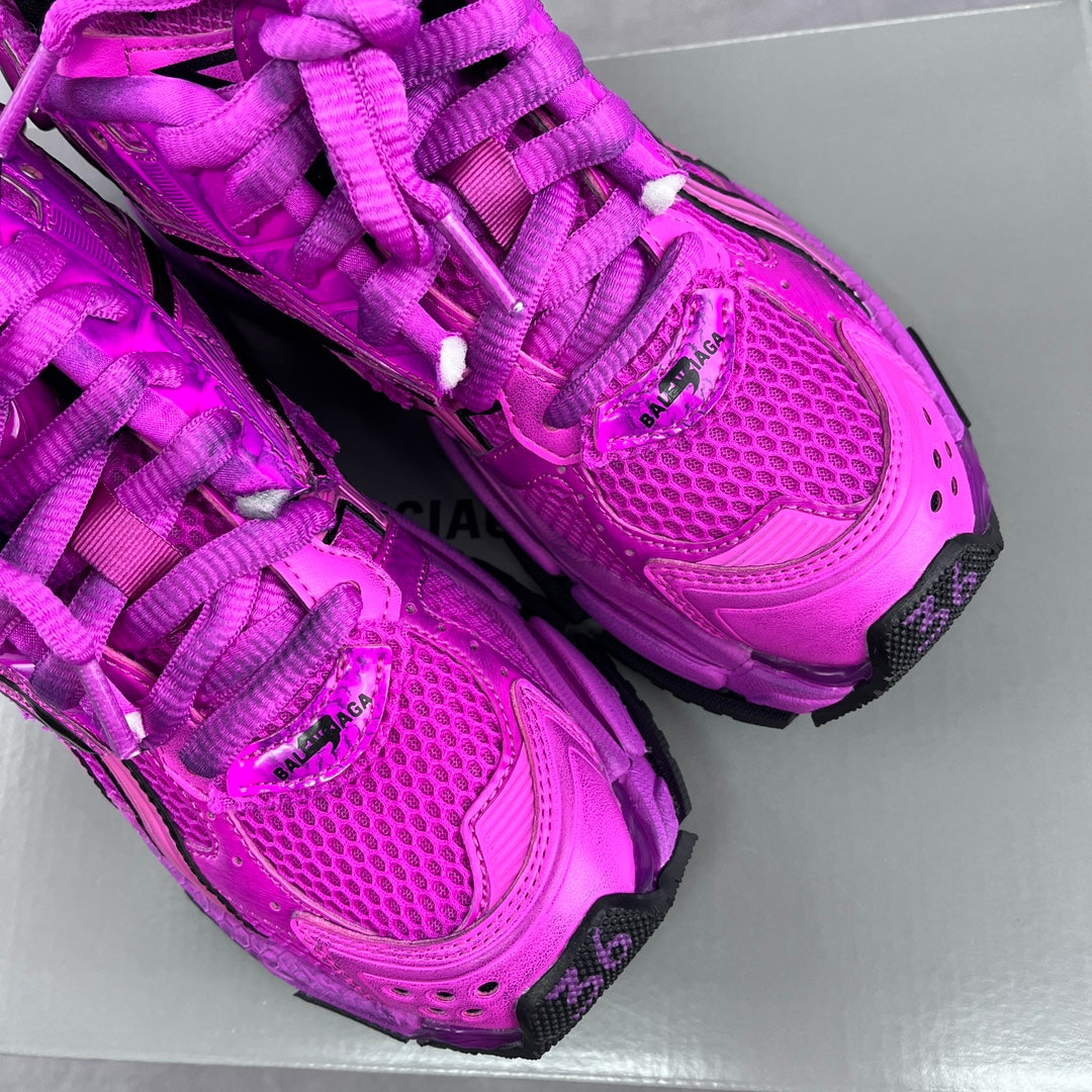 Balenciaga running sneakers heel close-up, bright pink mesh and molded accents