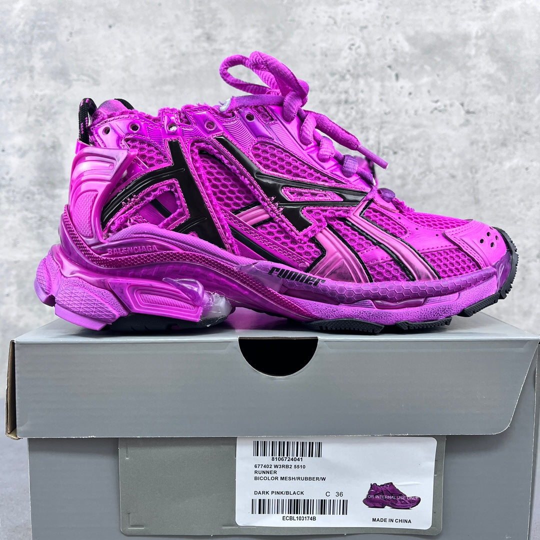 Balenciaga running sneakers, bright pink upper with black trim, on the box