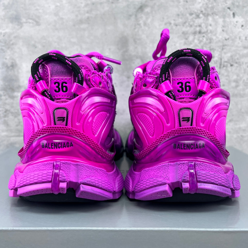 Balenciaga running sneakers back view, bright pink heel tabs marked with BALENCIAGA