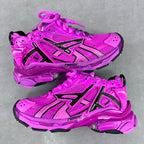 Balenciaga running sneakers in bright pink with black side stripes and lace-up design