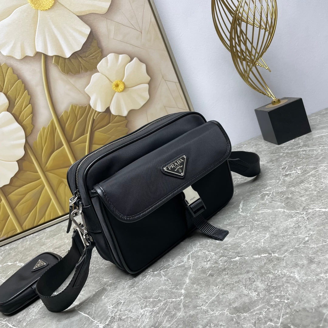 Prada black crossbody bag with detachable mini pouch and front strap