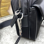 Prada black mini pouch with metal zipper pull and side D-ring
