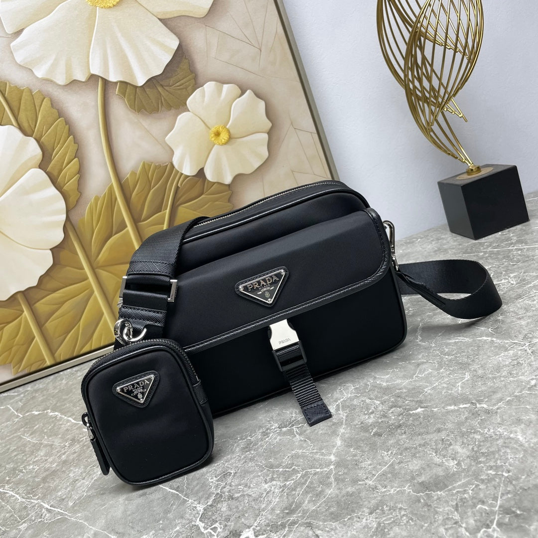 Prada black crossbody bag with top flap and adjustable strap