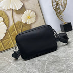 Prada black crossbody bag with smooth finish and adjustable strap