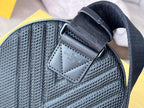 Louis Vuitton small bag with textured gray fabric, stitched label patch, and adjustable strap