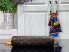 Louis Vuitton monogram shoulder bag with curved shape and tan strap, side view