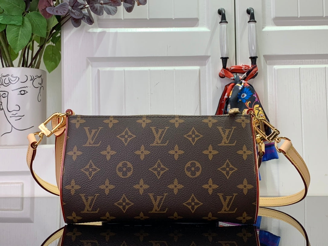 Louis Vuitton monogram shoulder bag with tan strap and gold hardware, front view