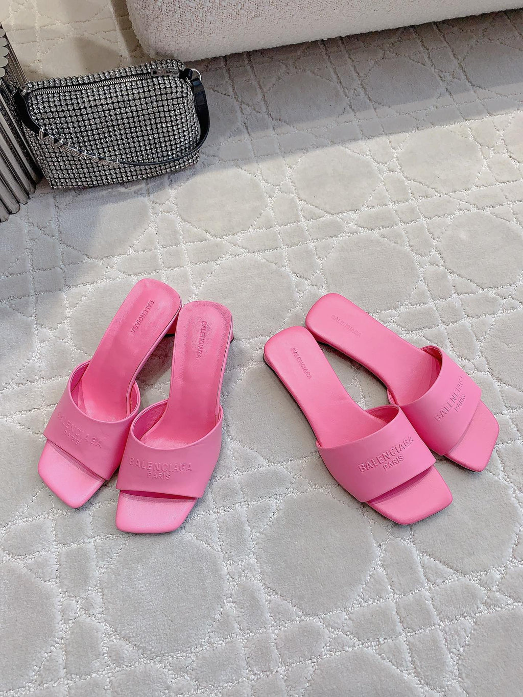 Pink Balenciaga slide sandals with wide straps and square open toe