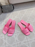 Pink Balenciaga slide sandals with wide straps and square open toe