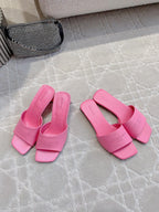Pink Balenciaga slide sandals with wide straps and square open toe