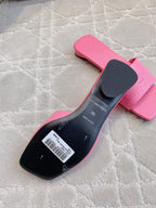 Pink Balenciaga slide sandal with black insole and size label