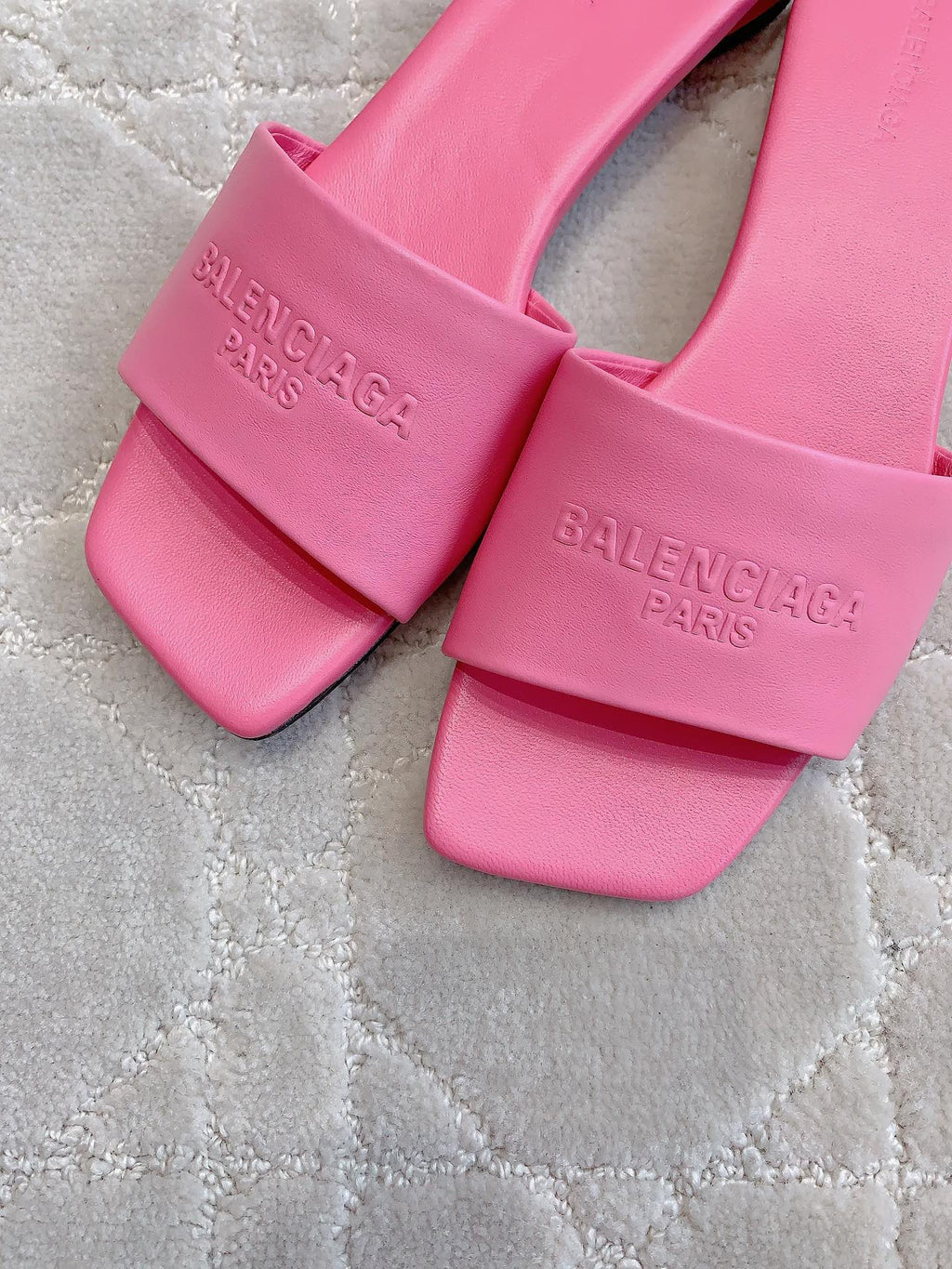 Pink Balenciaga slide sandals, logo embossing on wide upper straps
