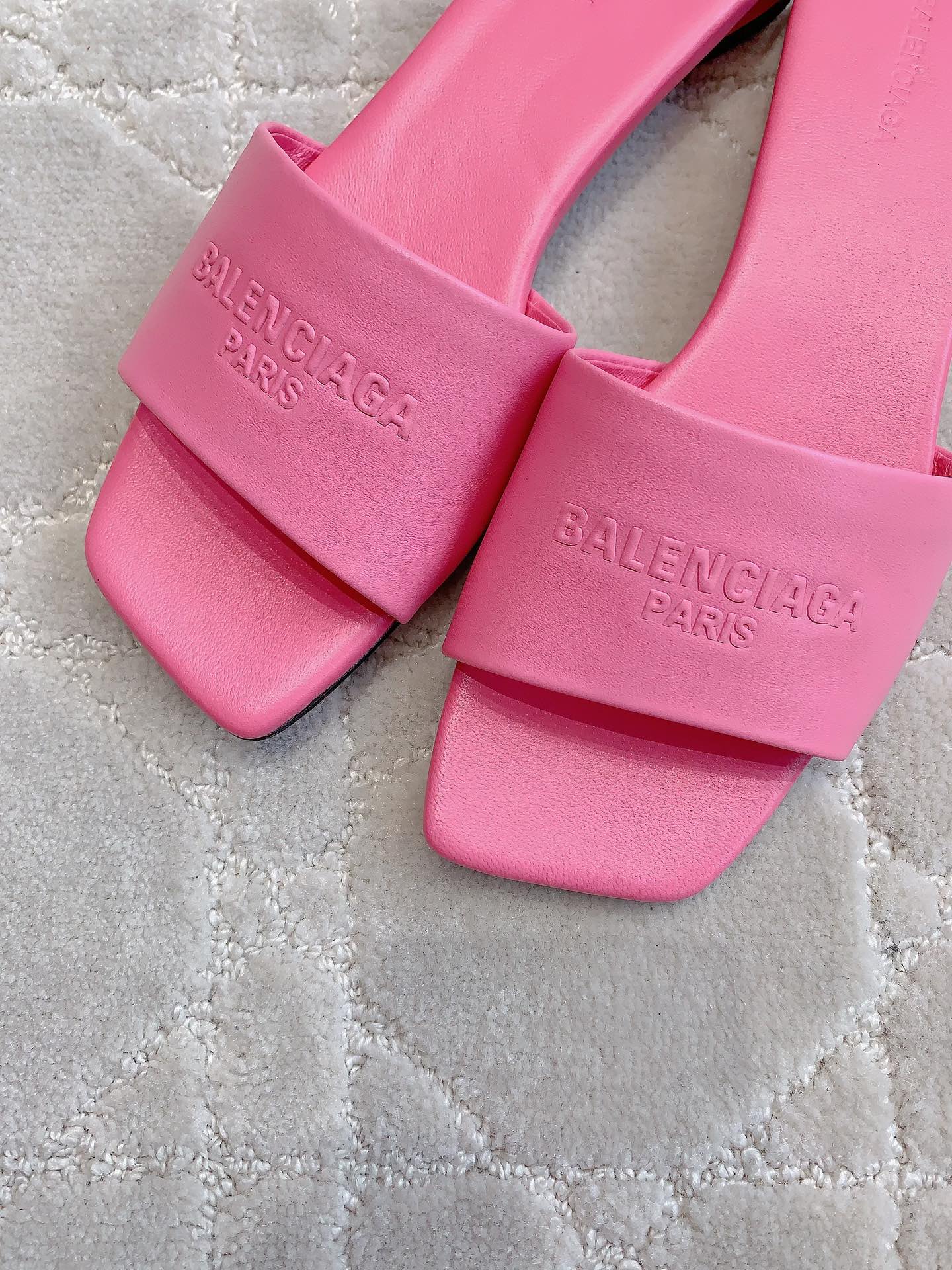 Pink Balenciaga slide sandals, logo embossing on wide upper straps