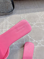Pink Balenciaga slide sandal footbed with embossed lettering
