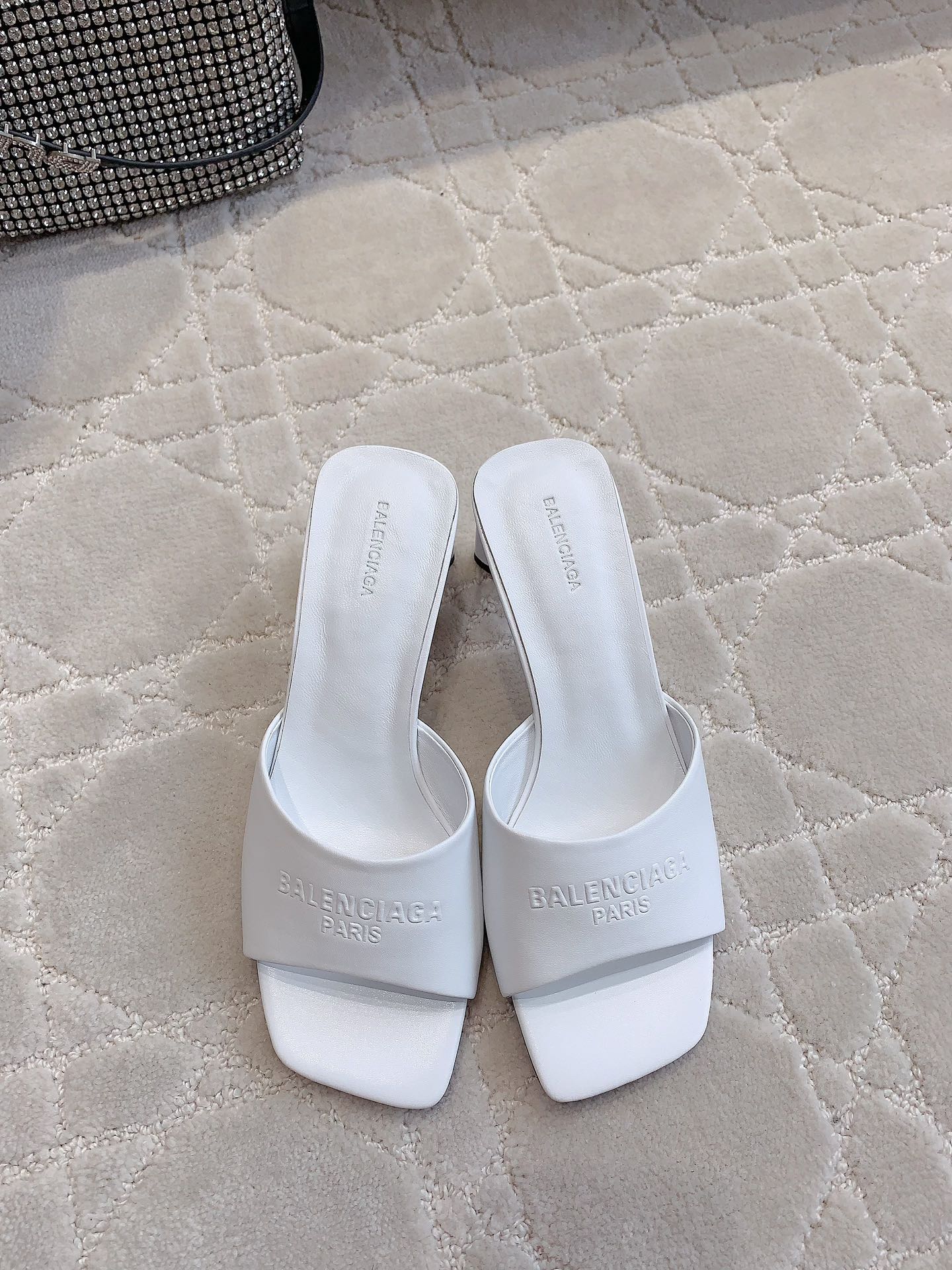 Balenciaga white mule sandals with Balenciaga Paris logo on strap