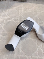 Balenciaga white sandals with black outsole and label on footbed