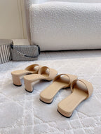 Beige block-heel slide sandals, pair