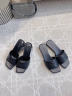 Balenciaga slide sandals, dark leather-look with wide strap and cushioned footbed