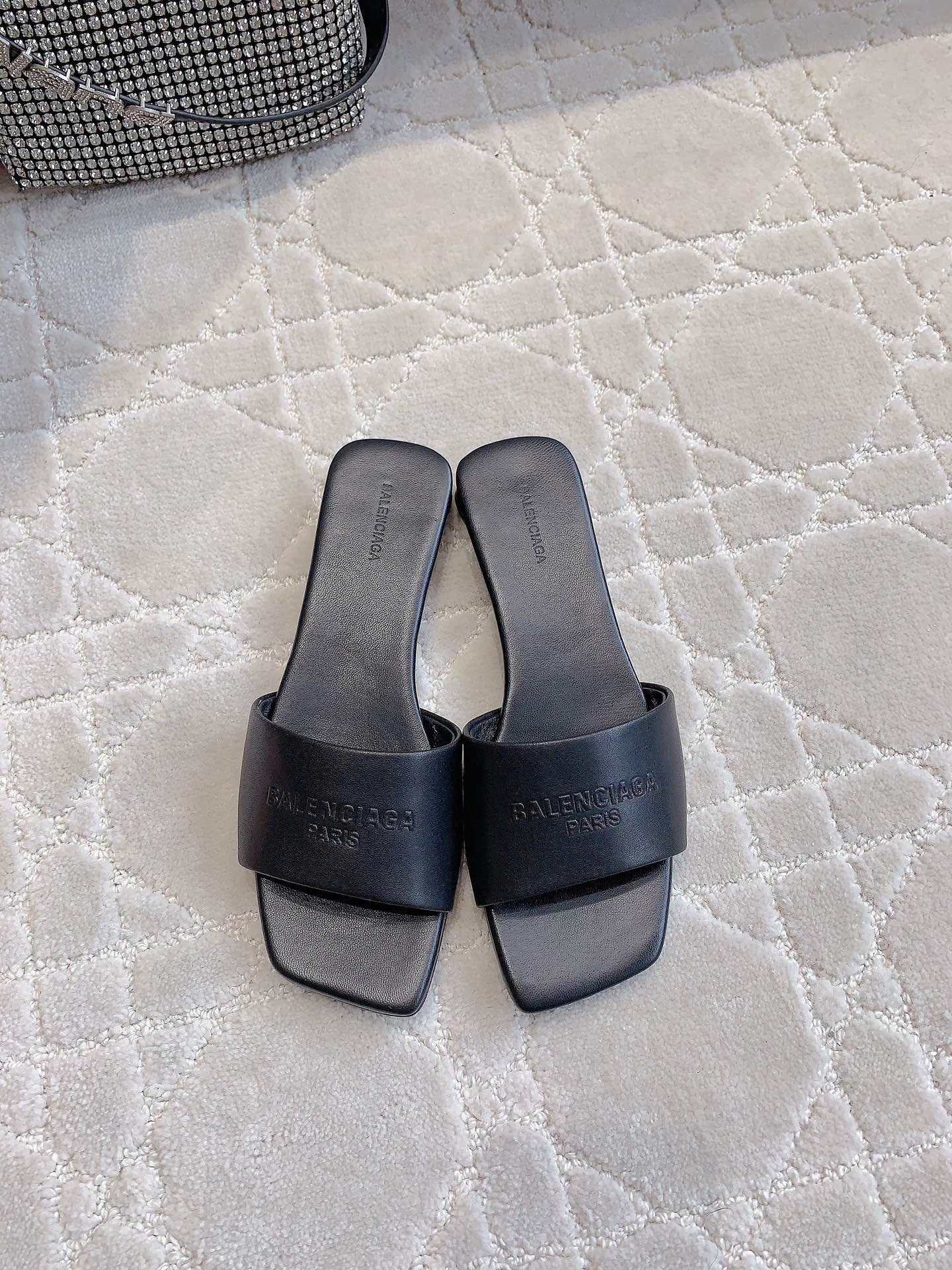 Balenciaga slide sandals, dark open-toe mules with wide strap and logo detail
