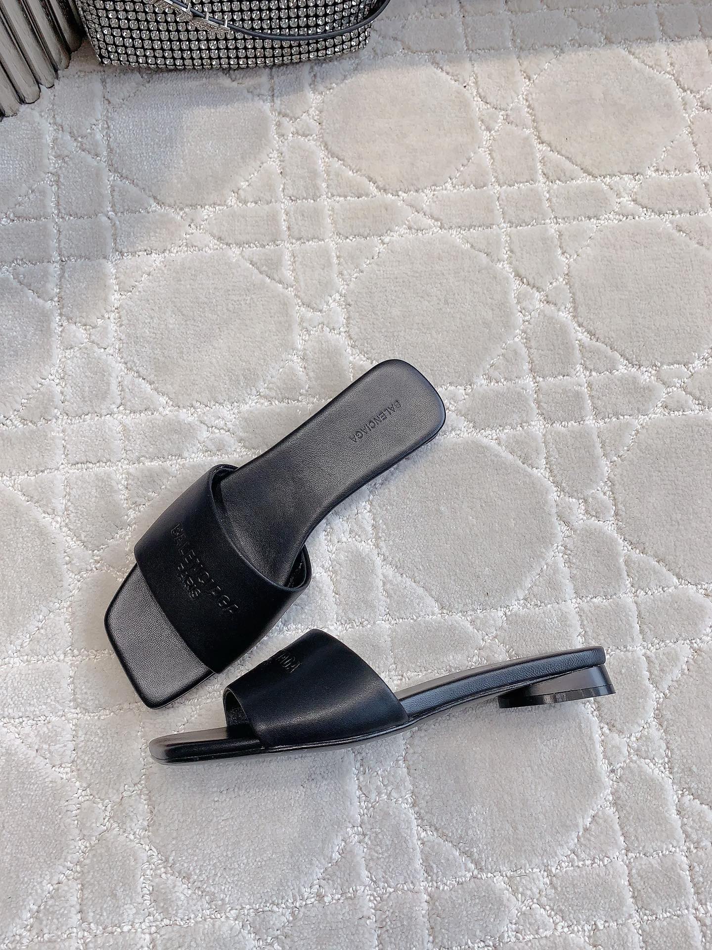 Balenciaga slide sandals, dark open-toe mules with squared toe and wide strap