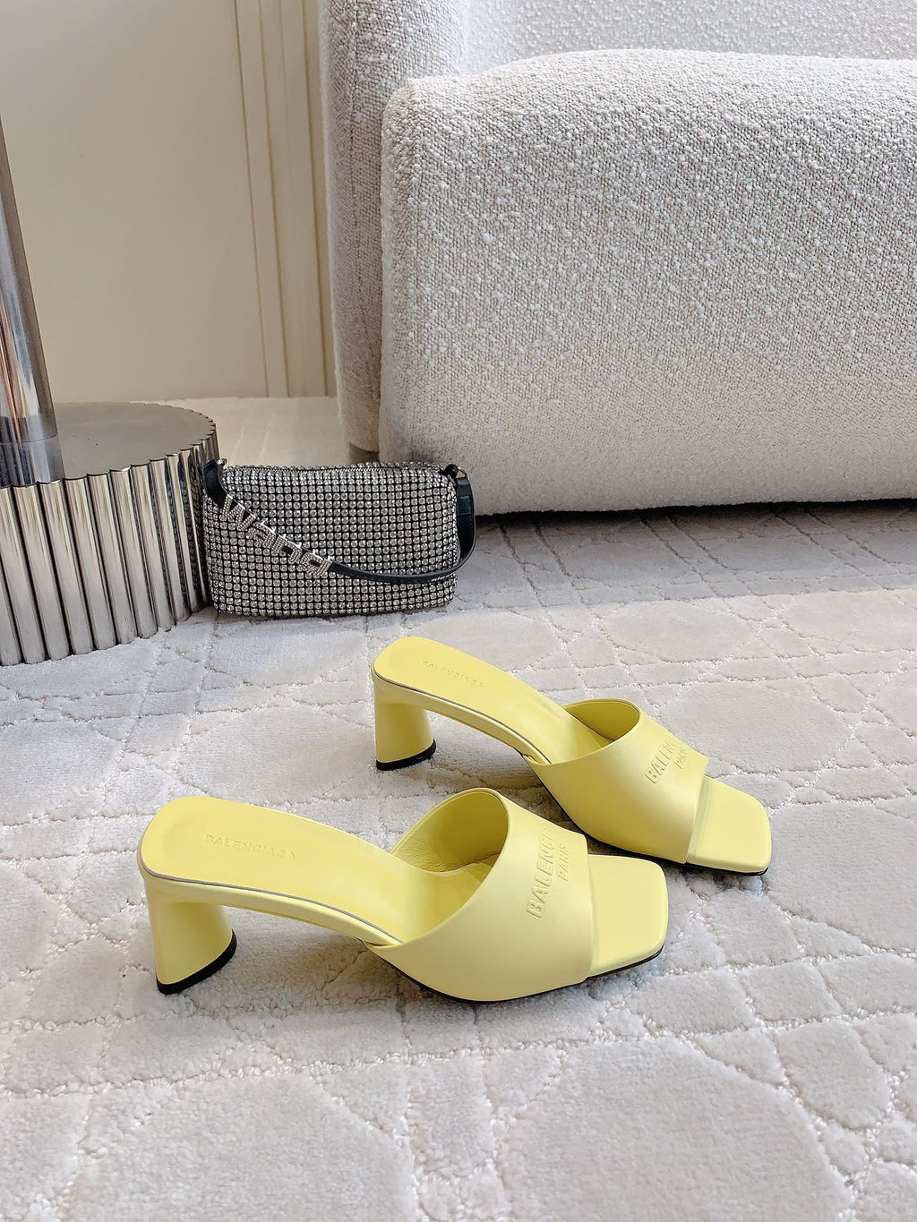 Yellow mule sandals with open back and thick block heels