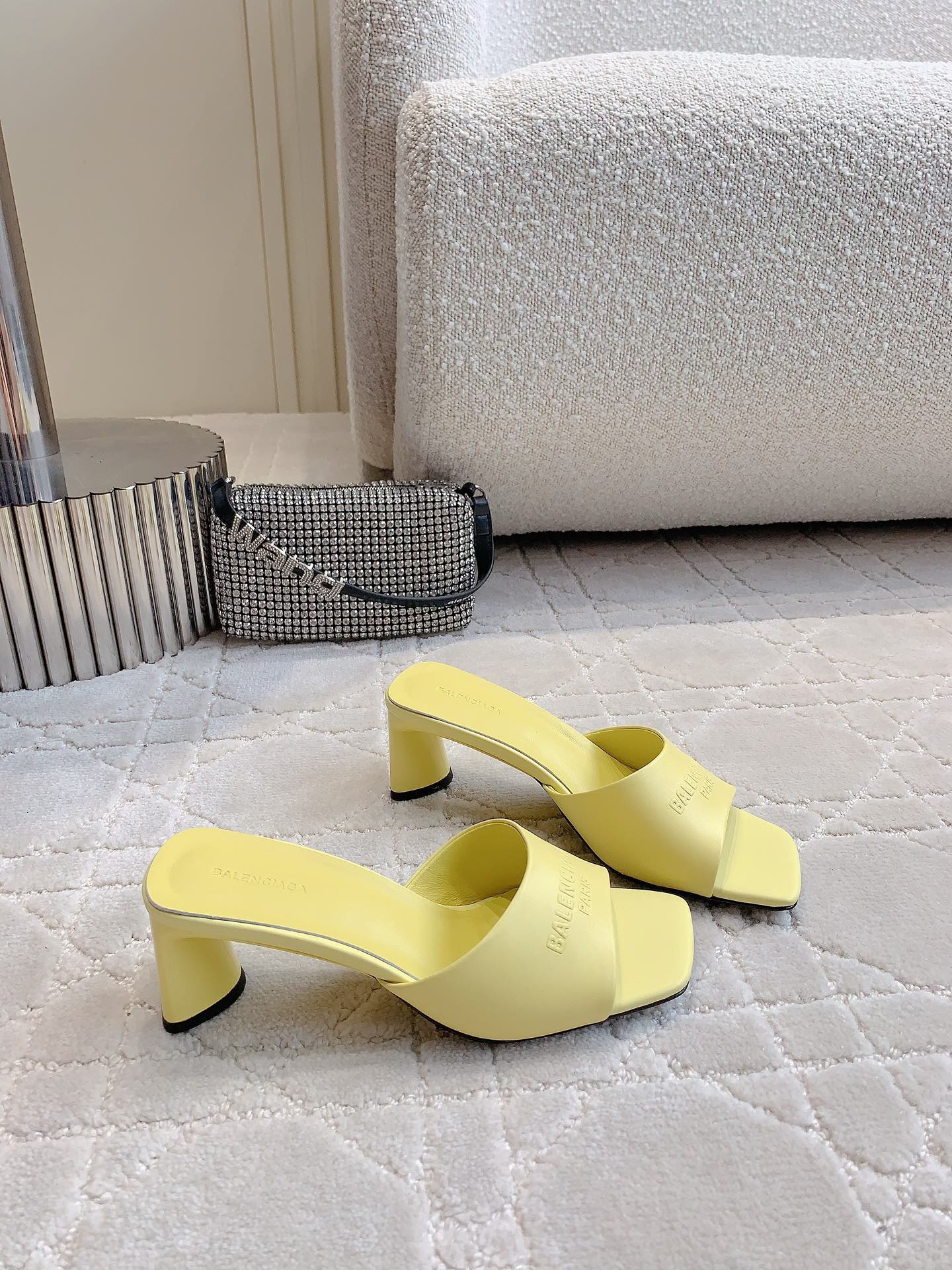 Yellow mule sandals with open back and thick block heels