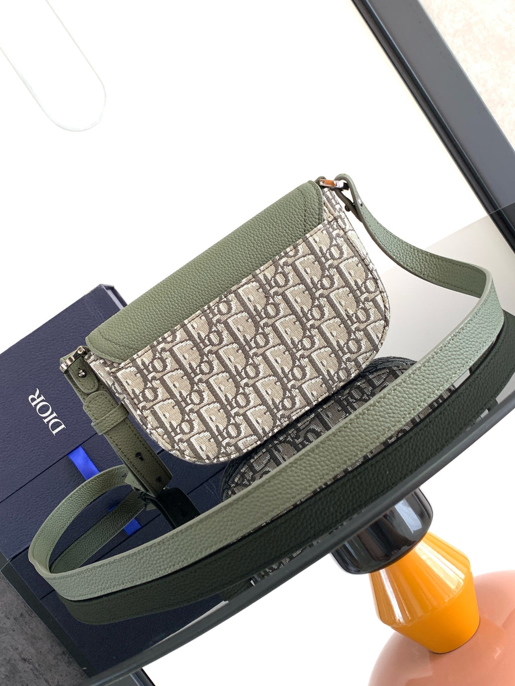 Olive green and beige Dior-style logo jacquard mini bag with front flap and strap