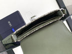 Open view of olive green mini bag with Dior-style jacquard interior trim