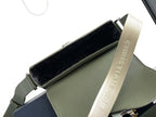 Dior men’s green leather bag interior with dark lining and beige webbing strap