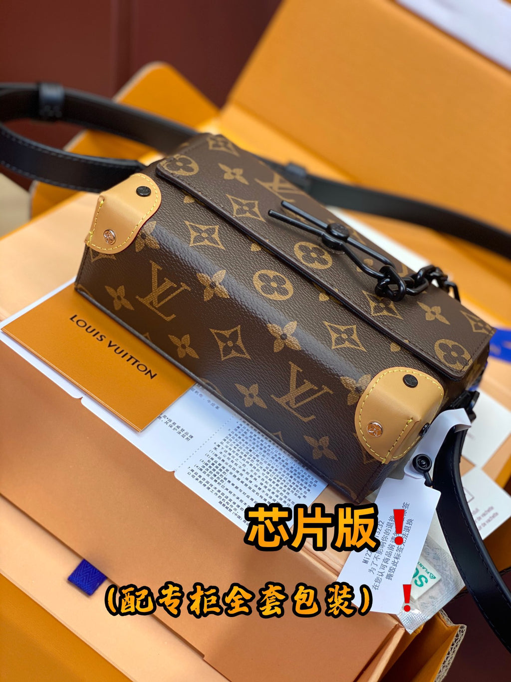 Louis Vuitton monogram crossbody bag with tan hardware and dark shoulder strap