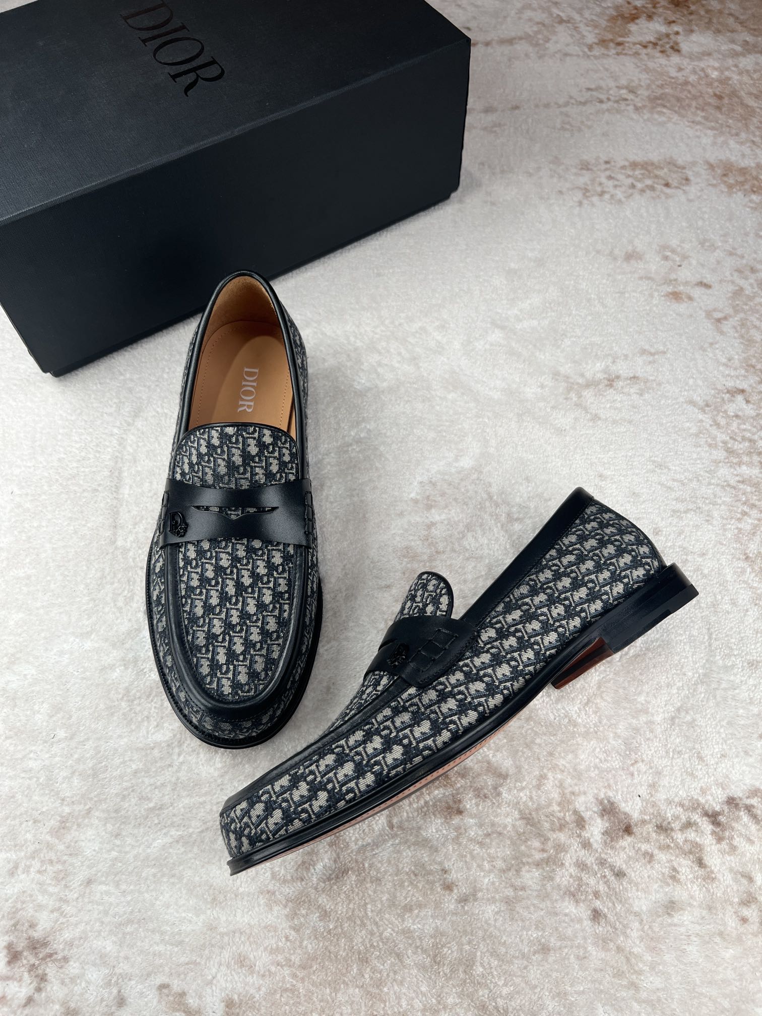 Dior unisex logo-print loafers, one shoe and one side view with strap detail