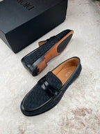 Black Dior unisex loafers with tan interior and textured vamp