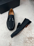 Black Dior unisex loafers, angled side view with strap