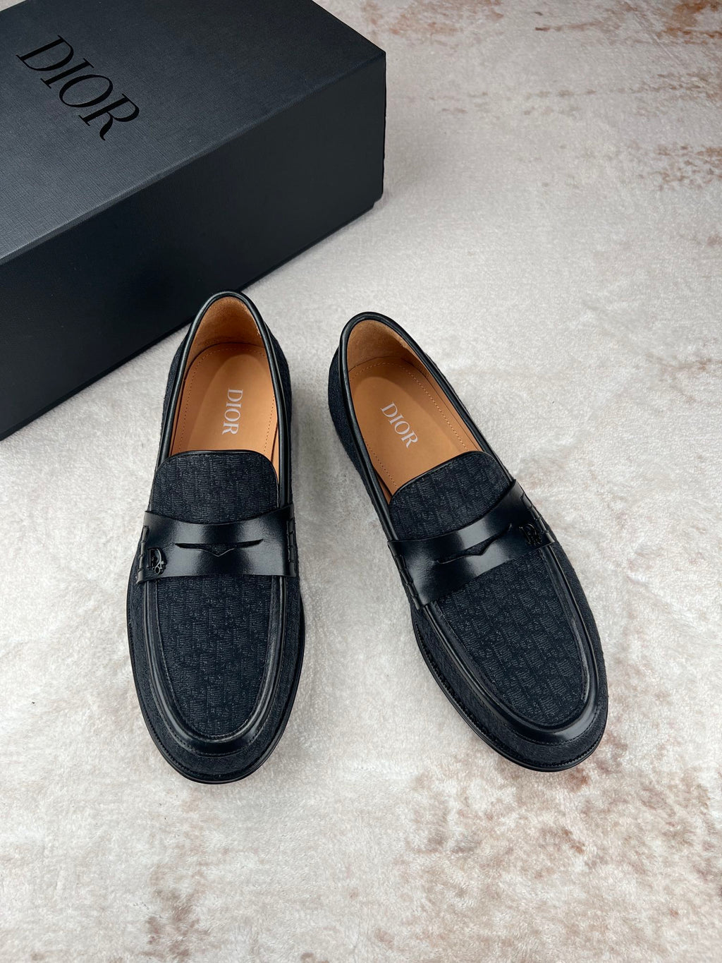 Black Dior unisex loafers, side view, with strap detail