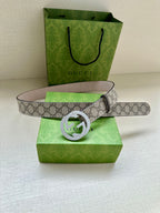 Gucci belt with beige GG canvas, silver double-G buckle, pink inner leather