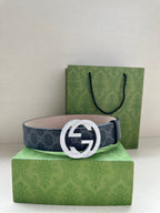 Gucci belt on green box: dark blue GG canvas and silver buckle