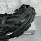Balenciaga unisex black sneaker side, textured overlays, lace-up front, chunky sole
