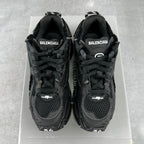 Balenciaga unisex black sneakers, heel view with BALENCIAGA lettering and lace-up closure