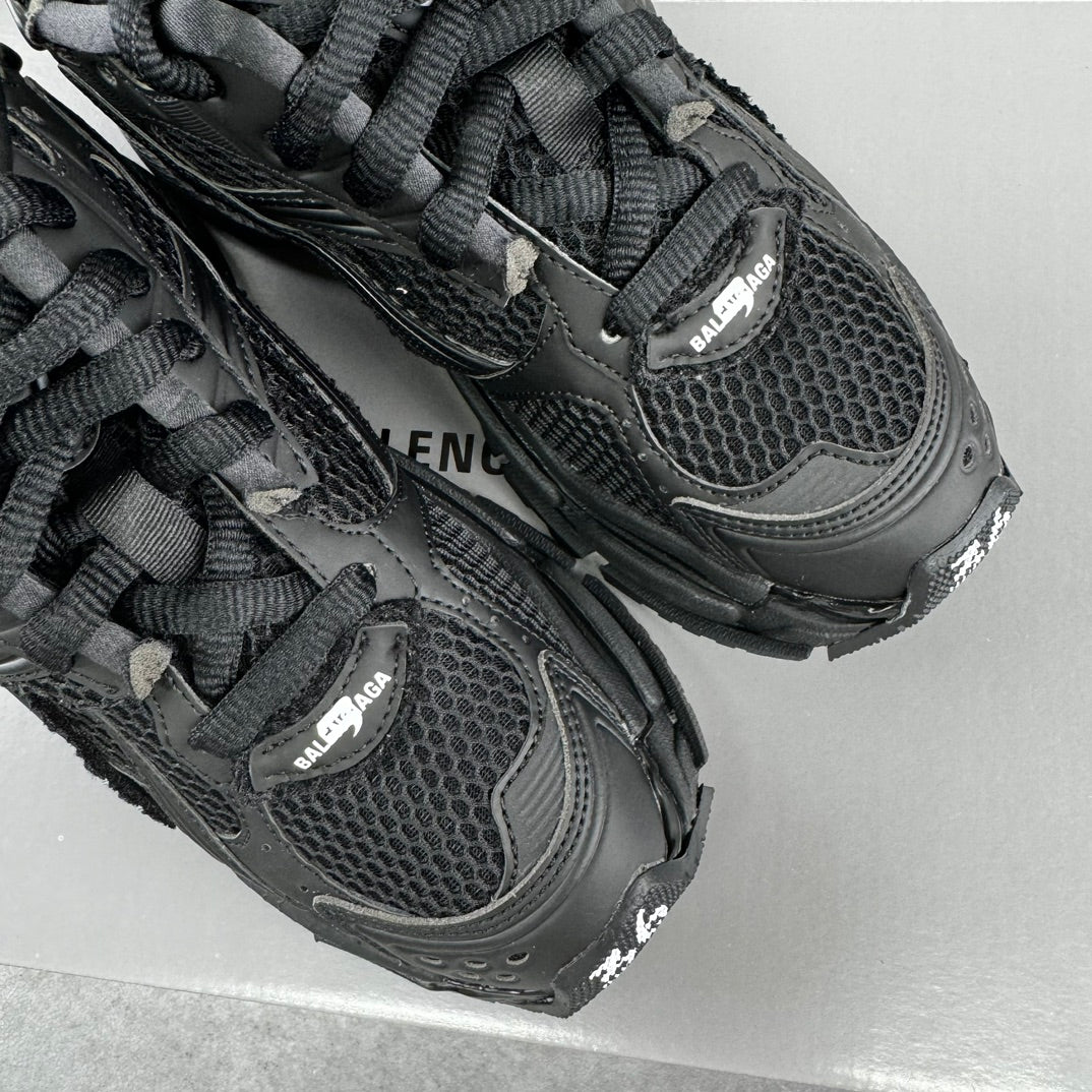 Balenciaga unisex black sneaker tongue and lace area, mesh panels with BALENCIAGA logo