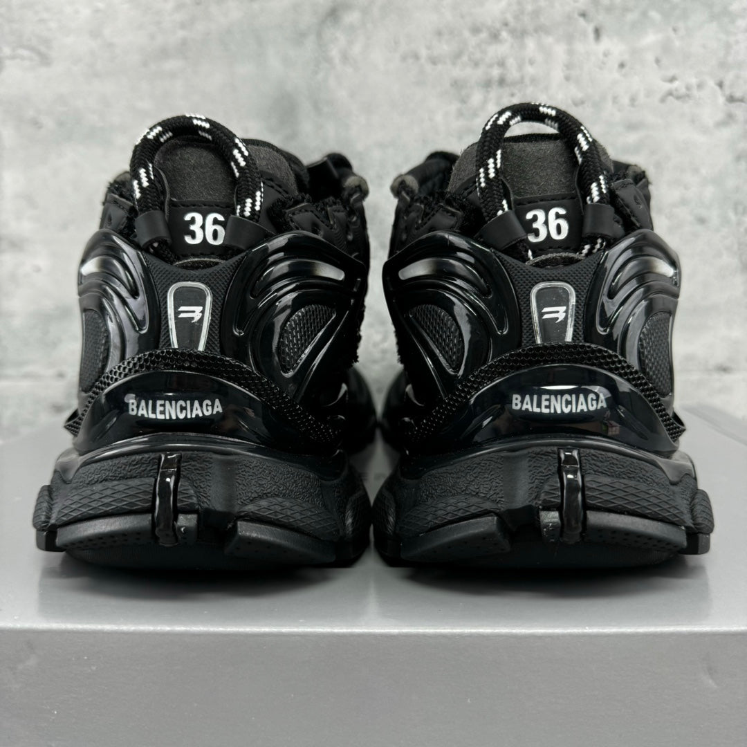 Balenciaga unisex black sneakers, back view with BALENCIAGA logos and size 36