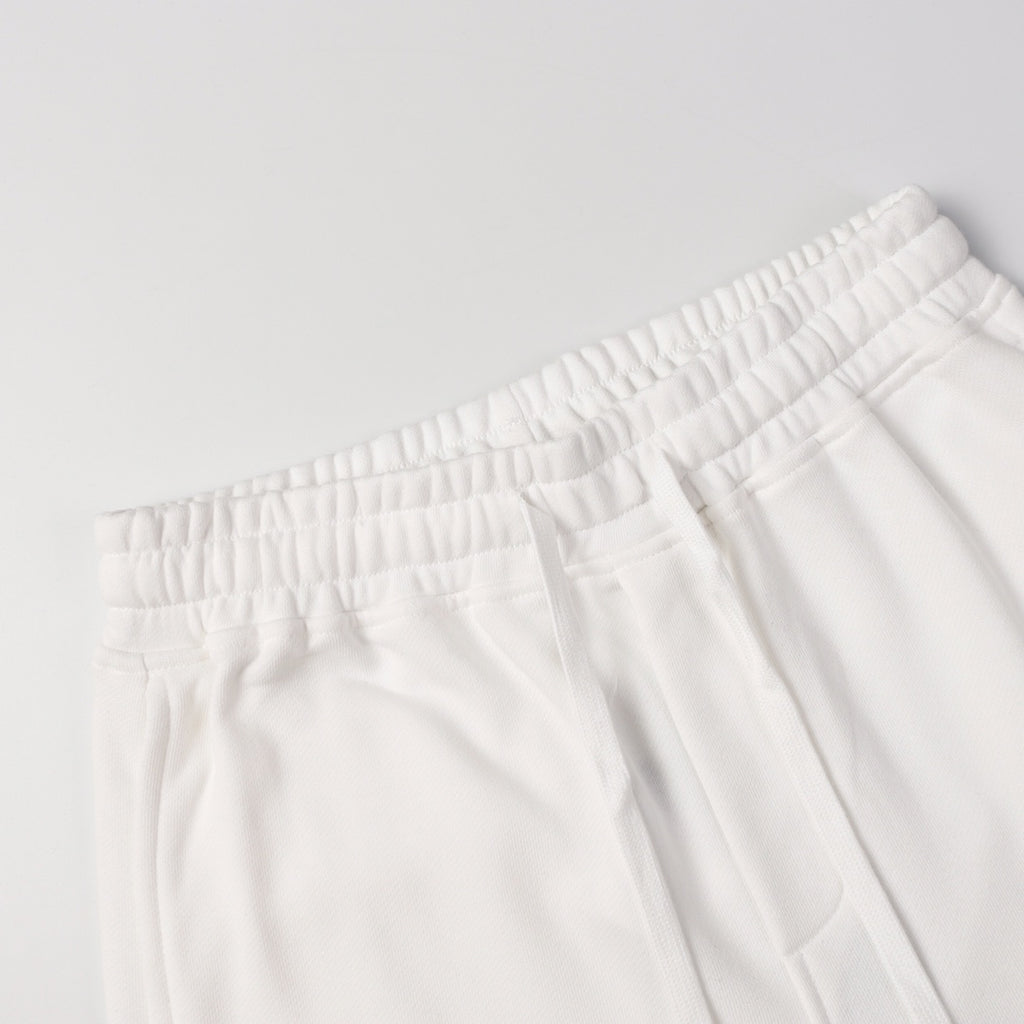 White shorts showing elastic waistband and front drawstring