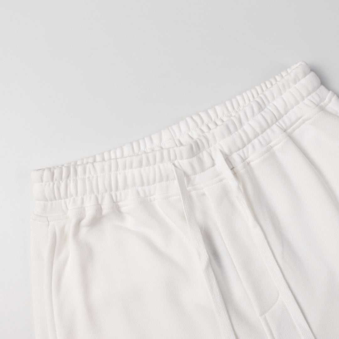 White shorts showing elastic waistband and front drawstring