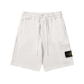 White drawstring shorts with elastic waistband and side pocket detail
