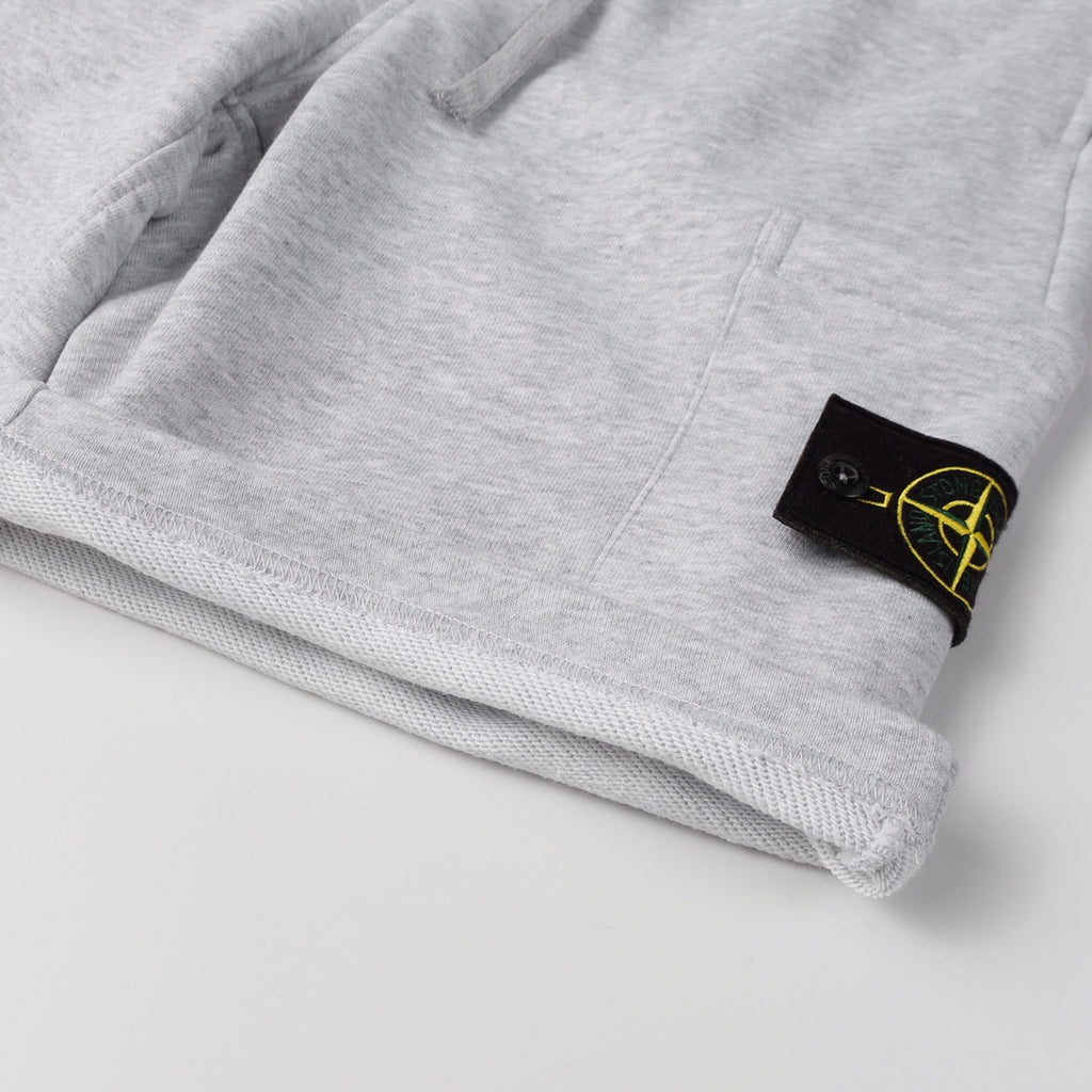 Stone Island shorts hem with black patch and yellow logo
